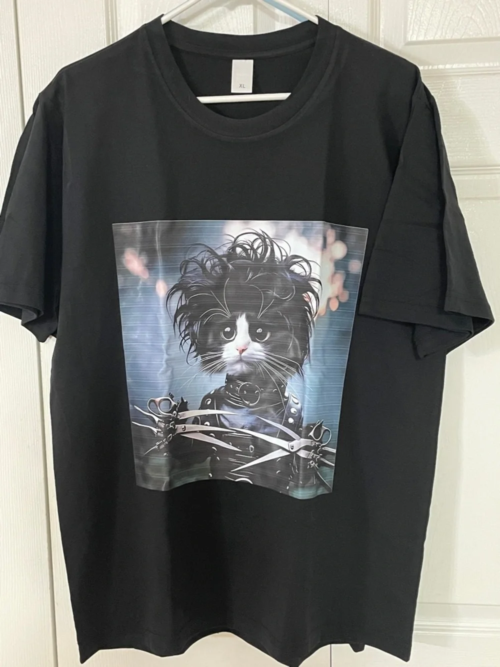 Black Cat Graphic T-Shirt Featuring Stylized Kitty